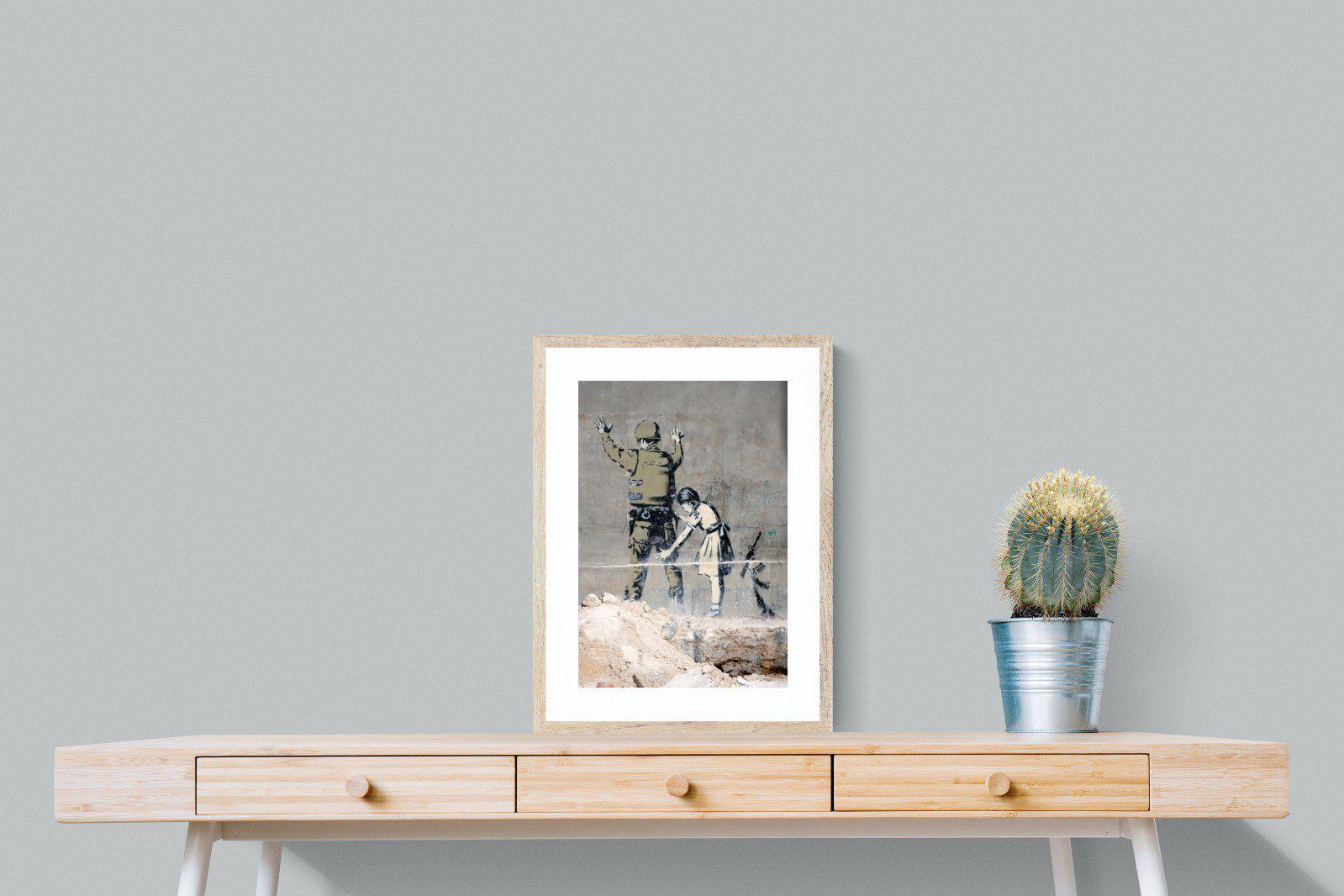 Girl Frisking Soldier-Wall_Art-45 x 60cm-Framed Print-Wood-Pixalot