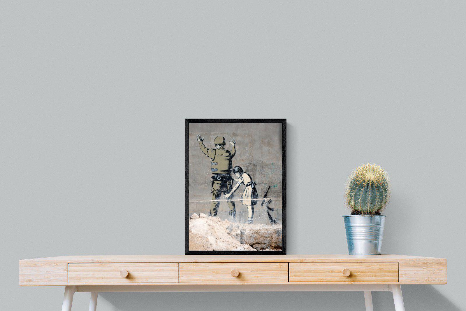 Girl Frisking Soldier-Wall_Art-45 x 60cm-Mounted Canvas-Black-Pixalot