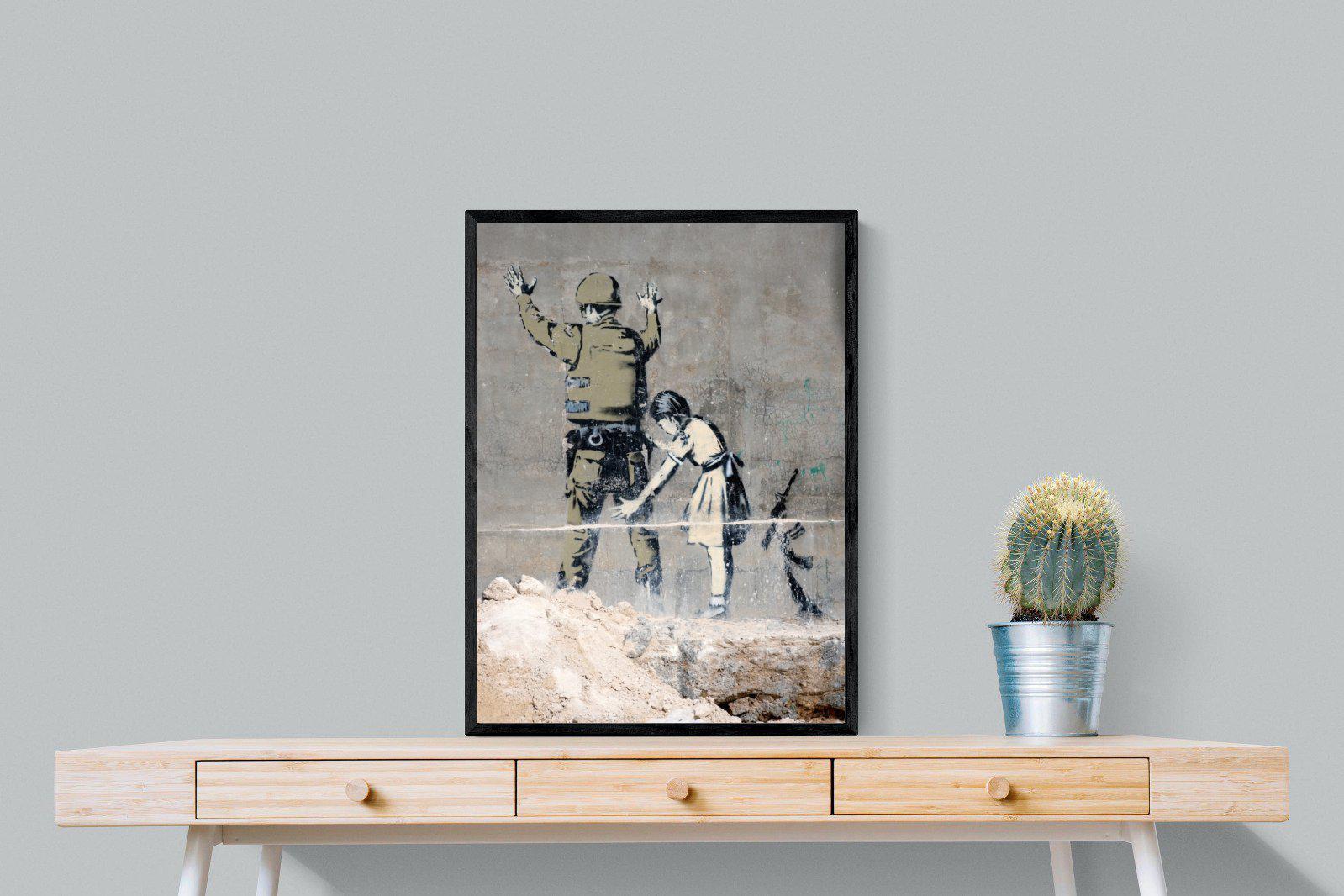 Girl Frisking Soldier-Wall_Art-60 x 80cm-Mounted Canvas-Black-Pixalot