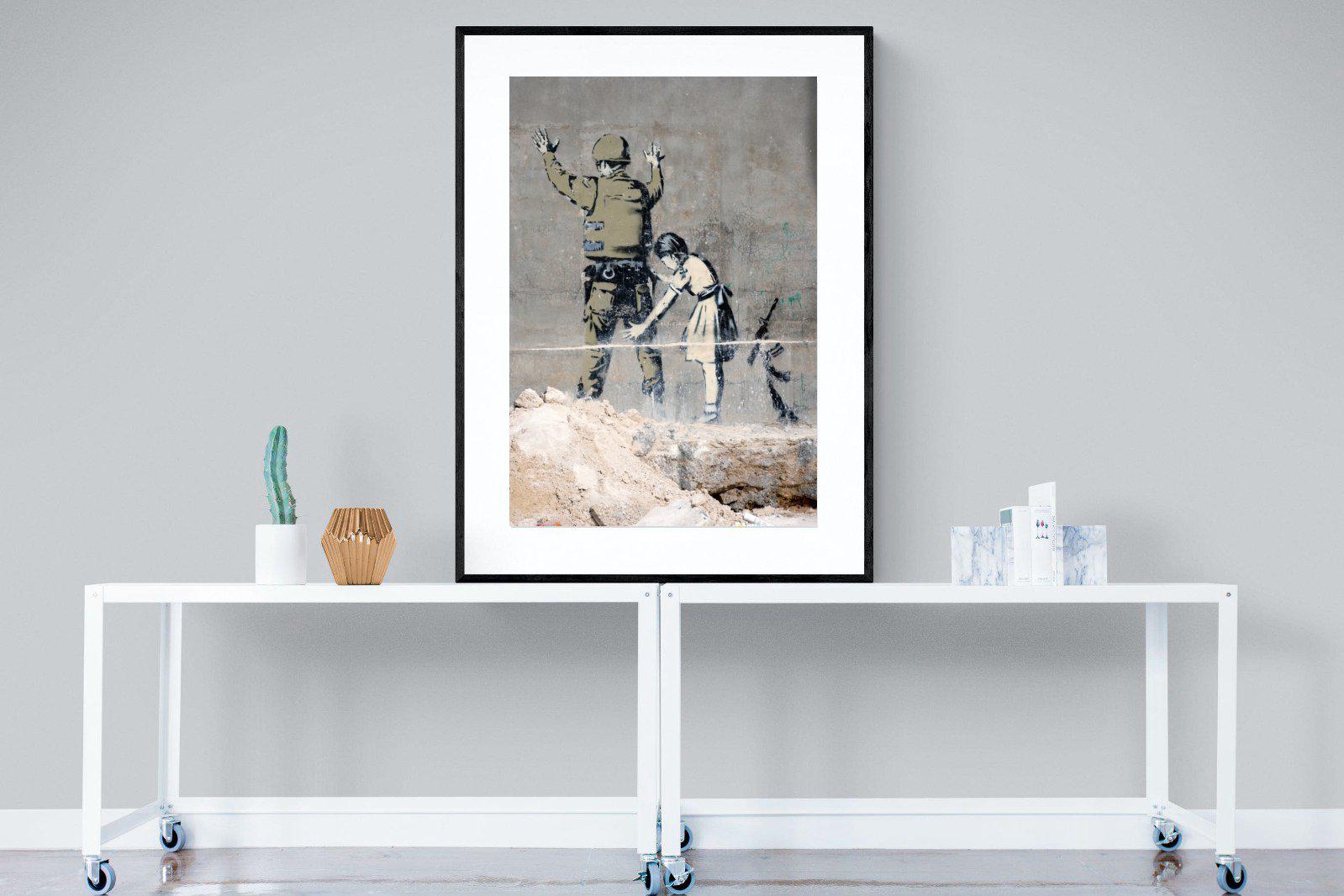 Girl Frisking Soldier-Wall_Art-90 x 120cm-Framed Print-Black-Pixalot